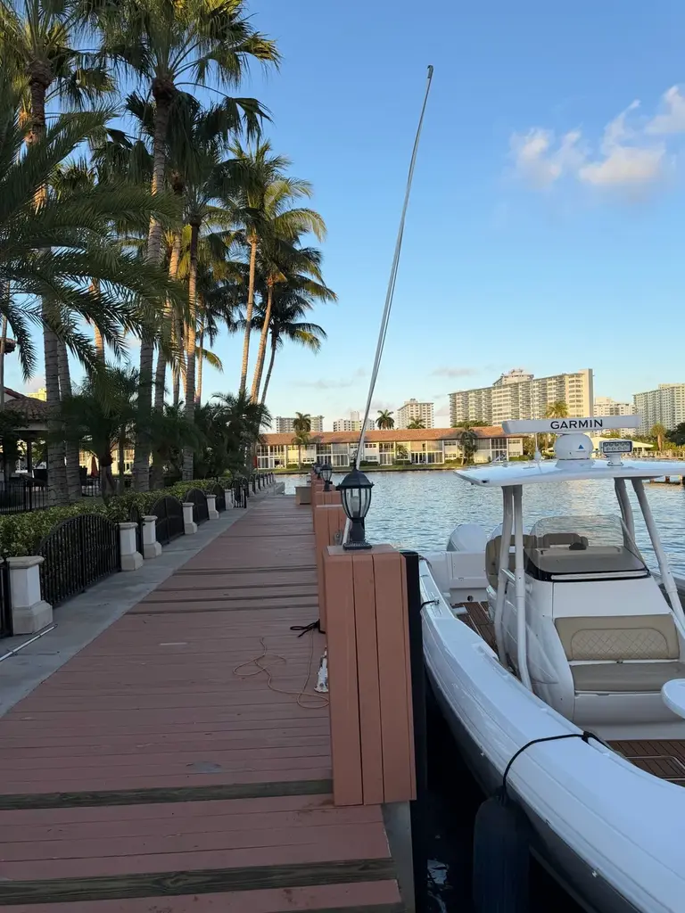 Professionally installed four-post boat lift on a composite dock
