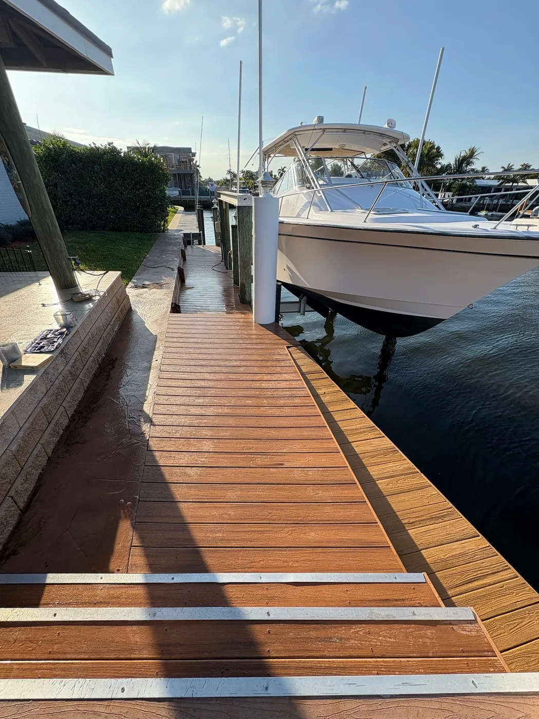 Marine-grade wood dock with boat lift